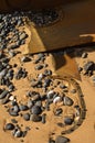 Wrecked boat hatches buried in the beach sand Royalty Free Stock Photo