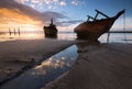 Old wrecked ship at sunrise