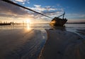 Old wrecked ship at sunrise