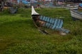 An old wrecked shipping boat on shore