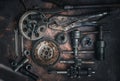 Old wrench and tools and carburetor on rusty background . moto