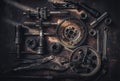 Old wrench and tools and carburetor on rusty background . moto