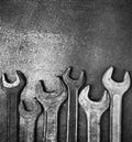 Old wrenches on a metal table Royalty Free Stock Photo