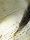 Old writing with a feather Royalty Free Stock Photo