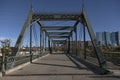 Old wrought iron bridge in Denver over teh South Platte River Royalty Free Stock Photo