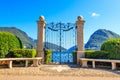 Old wrought iron gate overlooking Lake Lugano in Ciani Park, Lugano, Switzerland Royalty Free Stock Photo