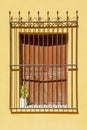 Old wrought iron grill window Royalty Free Stock Photo