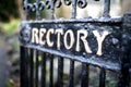 Old wrought iron Holy Trinity Rectory Gates with peeling paint a Royalty Free Stock Photo