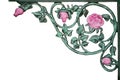 Old wrought iron pink rose vine bracket