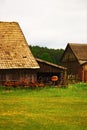 Old yard with buildings and machines in Polish village