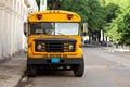 Old yellow american schoolbus in a street of Havana in Cuba Royalty Free Stock Photo