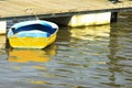 Old Yellow Boat at the Dock Royalty Free Stock Photo