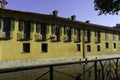 Old yellow building on the Martesana canal at Milan