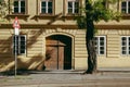 Old yellow building and morning street in Prague, Czech Republic Royalty Free Stock Photo