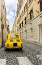 Old Yellow Car in Rome Royalty Free Stock Photo