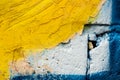 Old yellow cement and blue brick wall. Beautiful concrete stucco. painted cement. background texture wall Royalty Free Stock Photo