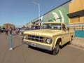 Old yellow Chrysler Dodge D 100 V8 pickup truck late 1960s in the street. Classic car show Royalty Free Stock Photo