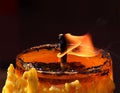 Old yellow color candle flame Royalty Free Stock Photo