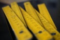 Old yellow folding meter ruler measuring centimeters