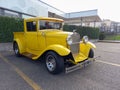 Old yellow Ford Model A pickup truck hot rod circa 1930 in a parking lot. Buenos Aires, Argentina Royalty Free Stock Photo