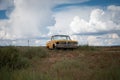 Old yellow Ford Rancherto pickup truck abandoned in the desert Royalty Free Stock Photo