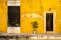 Old yellow house at the magical town of Izamal in Mexico Royalty Free Stock Photo