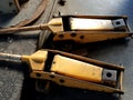 Old yellow hydraulic floor jacks