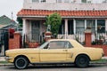 Old yellow Mustang, in Sherman Heights, San Diego, California