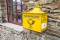 Old yellow post mailbox in Germany Royalty Free Stock Photo