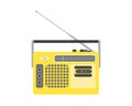An old yellow radio with an antenna.