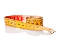 Old yellow and red measure tape rolled Royalty Free Stock Photo