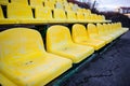 Old yellow seat in stadium closeup Royalty Free Stock Photo