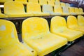 Old yellow seat in stadium closeup Royalty Free Stock Photo