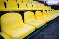 Old yellow seat in stadium closeup Royalty Free Stock Photo
