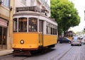 Old yellow tram on streets of Lisbon Royalty Free Stock Photo