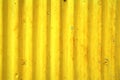 Old yellow vintage corrugated metal background and texture surface pattern