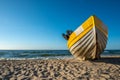 A yellow white boats on beautiful beach Royalty Free Stock Photo