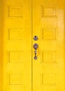 Old yellow wooden stylish door