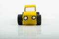 Old yellow wooden toy car Royalty Free Stock Photo