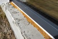 Old yellowed mounting foam under a large terrace window, visible styrofoam insulating the foundations of the house. Royalty Free Stock Photo