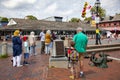 Old and young people from different sexes and etnicities gathered around Kunte Kinte memorial Royalty Free Stock Photo