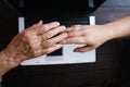 Old and young women hands at keyboard background Royalty Free Stock Photo