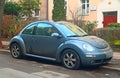 Old veteran or youngtimer private small compact car VW New Beetle first model parked