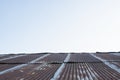 Old zinc roof and blue sky background Royalty Free Stock Photo