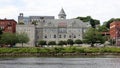 Olde Federal Building, landmark edifice, waterfront view across the Kennebec River, Augusta, ME Royalty Free Stock Photo