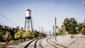 Olde town arvada Colorado water tower and train tracks Royalty Free Stock Photo