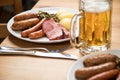 Oldenburger green cabbage with sausage mix, Kassler pork neck, boiled potatoes, mustard, beer and grain liquor is an traditional Royalty Free Stock Photo
