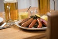 Oldenburger green cabbage with sausage mix, Kassler pork neck, boiled potatoes, mustard, beer and grain liquor is an traditional Royalty Free Stock Photo