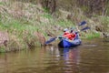 Older Active People. Kayaking trip on the river. Active recreation on the water