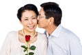 Older asian couple with rose Royalty Free Stock Photo